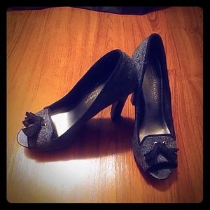 Size 7 black, grayish heels.